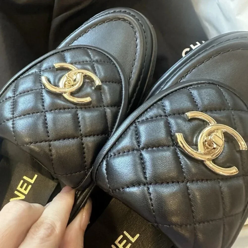 CHANEL Black Quilted Loafers with Gold Accents - Picture 3 of 5